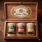 Open wooden Tallow Man presentation box with three Beard + Body Butter jars: Tobacco Vanilla, Old Time Barbershop and Bay Rum.
