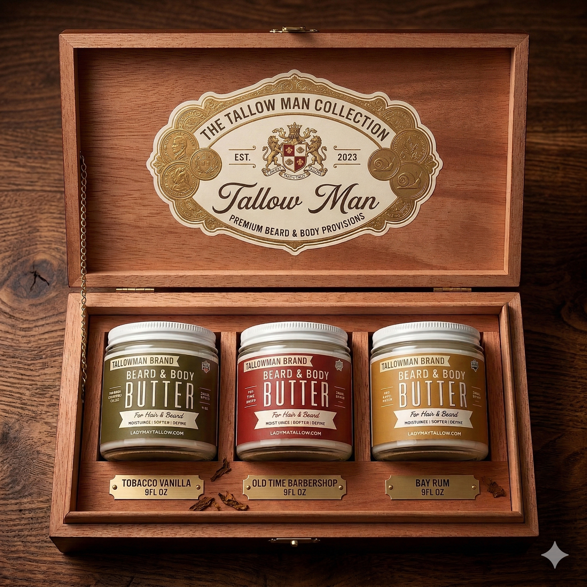 Open wooden Tallow Man presentation box with three Beard + Body Butter jars: Tobacco Vanilla, Old Time Barbershop and Bay Rum.